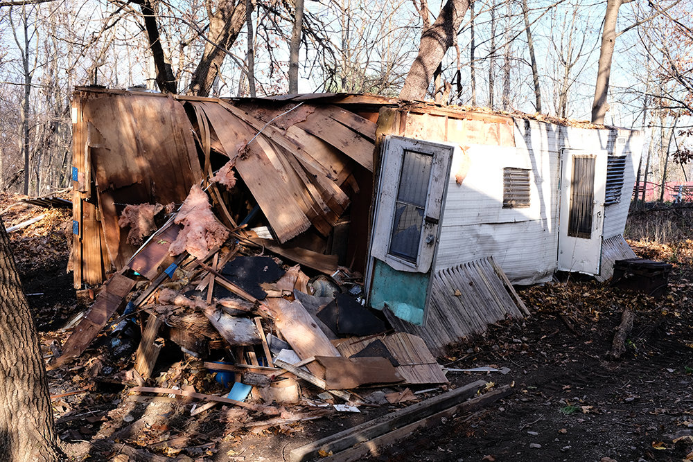 A decaying house trailer was also taken away.